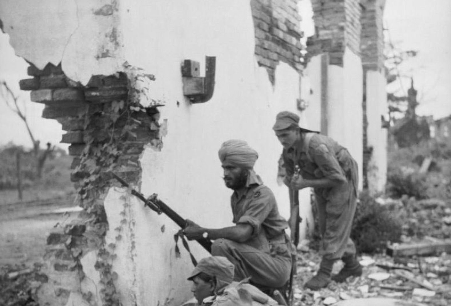 The 20th Indian Infantry Division search for Japanese in Prome, Burma. 